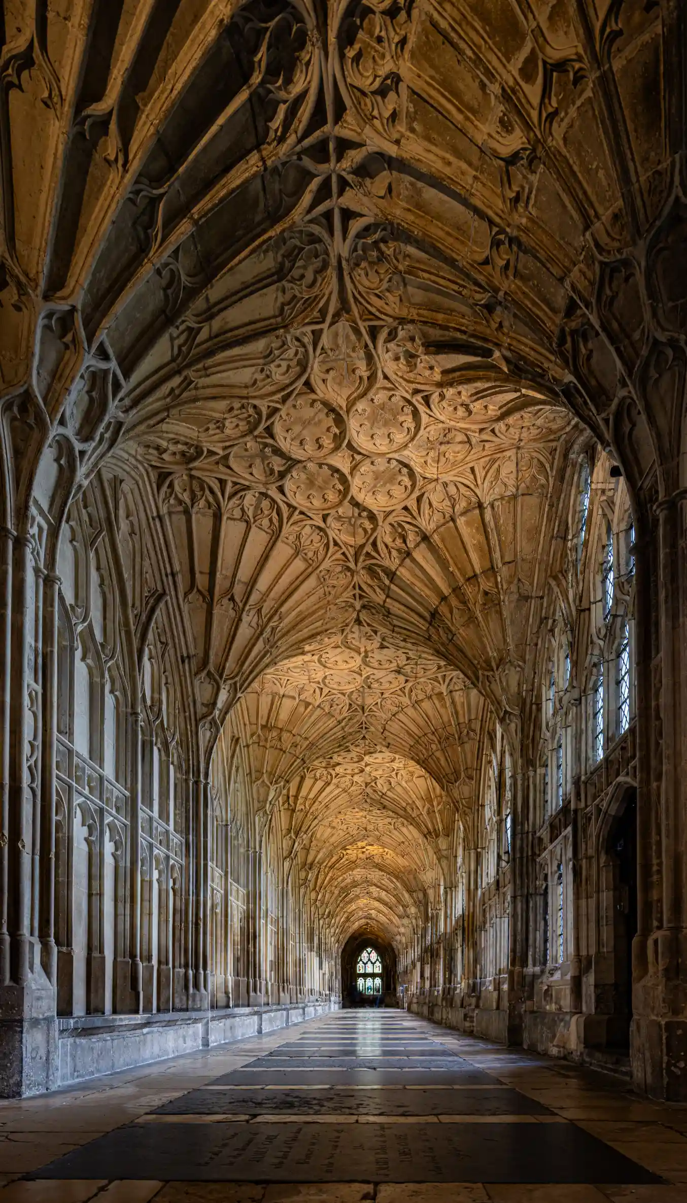 Old building with detailed carvings and sculptures on the ceiling.