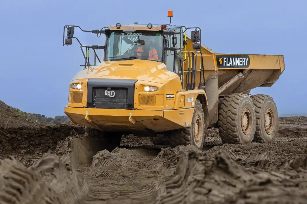 CAT articulated dumptruck working on a construction site.
